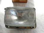 Suzuki Nos SM11K, SM21K, SM30K, SM40K, Head Lamp Assembly, # 35100-97320. S40. Fixed Price $39.99.