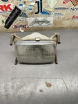 1988-1995 Polaris Trail Boss 250 Oem Headlight Assembly W/hardware 4032038. Fixed Price $34.99.