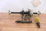 2002 Polaris Scrambler 90 Rear Swing Arm Axle Brake Hub Shock Assembly. Fixed Price $289.00.