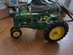 Ertl Eska John Deere Model Farm Tractor Die Cast Toy 1/16 Scale. Fixed Price $39.99.