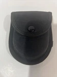 Uncle Mikes Sentinel Single Handcuff Case Black Molded Nylon - 89068. Fixed Price $9.07.